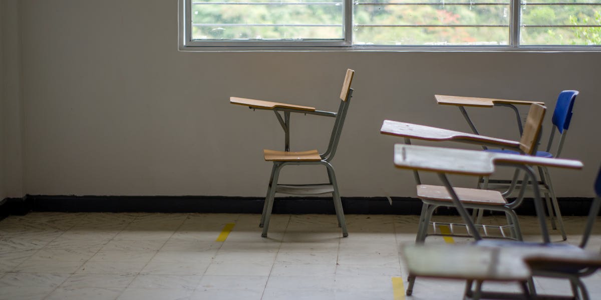 Empty school classroom — children missing from education and county lines exploitation
